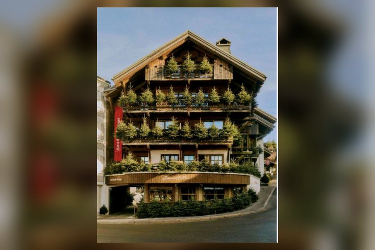 Façade de chalet fleurie d'une maison Relais & Châteaux